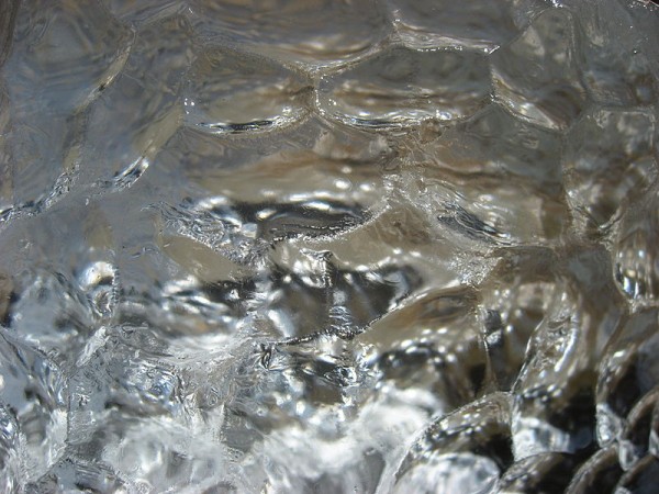Surface of black ice growler (photo by Kim Hansen on Wikimedia Commons)