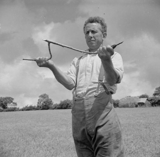 Dowsing: George Casely finding water on his Devon farm,1942 (photo from Wikimedia Commons)