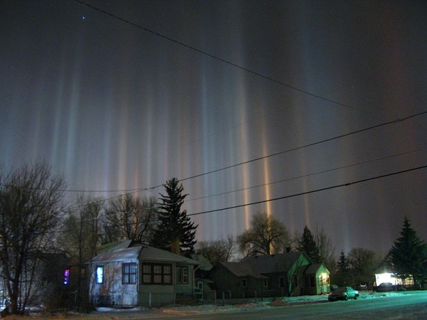 Light pillars in Laramie, Wyoming (photo from Wikimedia Commons, Creative Commons license)