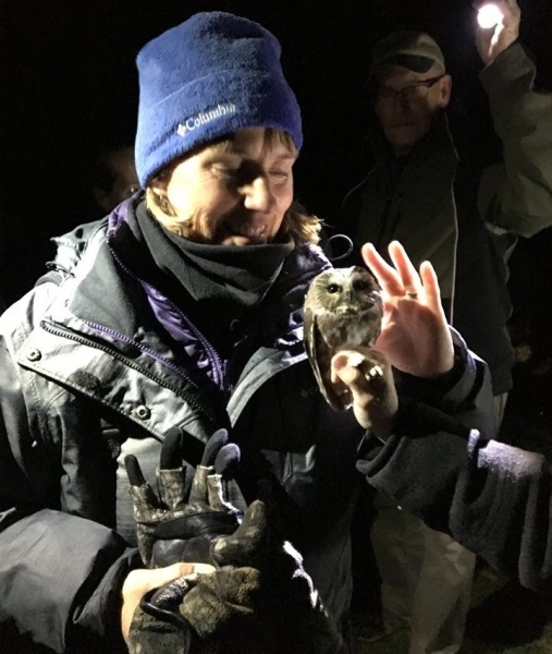Donna Foyle pets the owl (photo courtesy Donna Foyle)