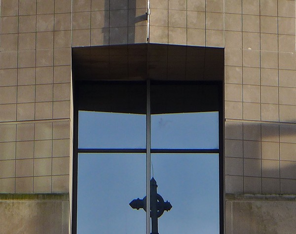 Front door vault at SEI with peregrine smudge on sky-background of top right glass (photo by Kate St. John)