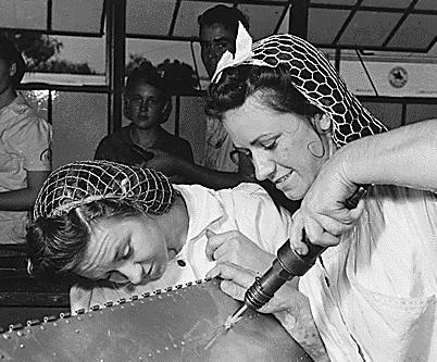 Women workers wearing snoods, 1942 (photo from Wikimedia Commons)