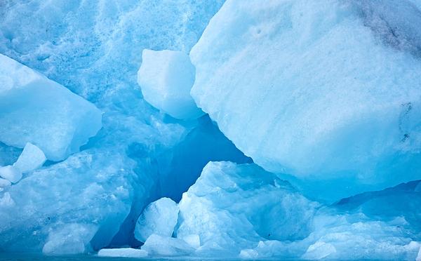 Blue ice at a glacier in Iceland (photo from Wikimedia Commons)